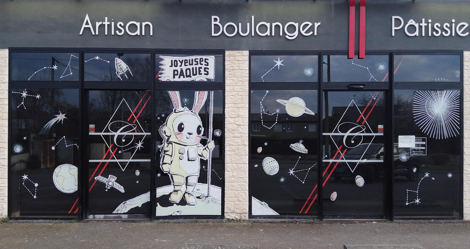 Vitrine de Pâques cosmique avec lapin astronaute et décor spatial
