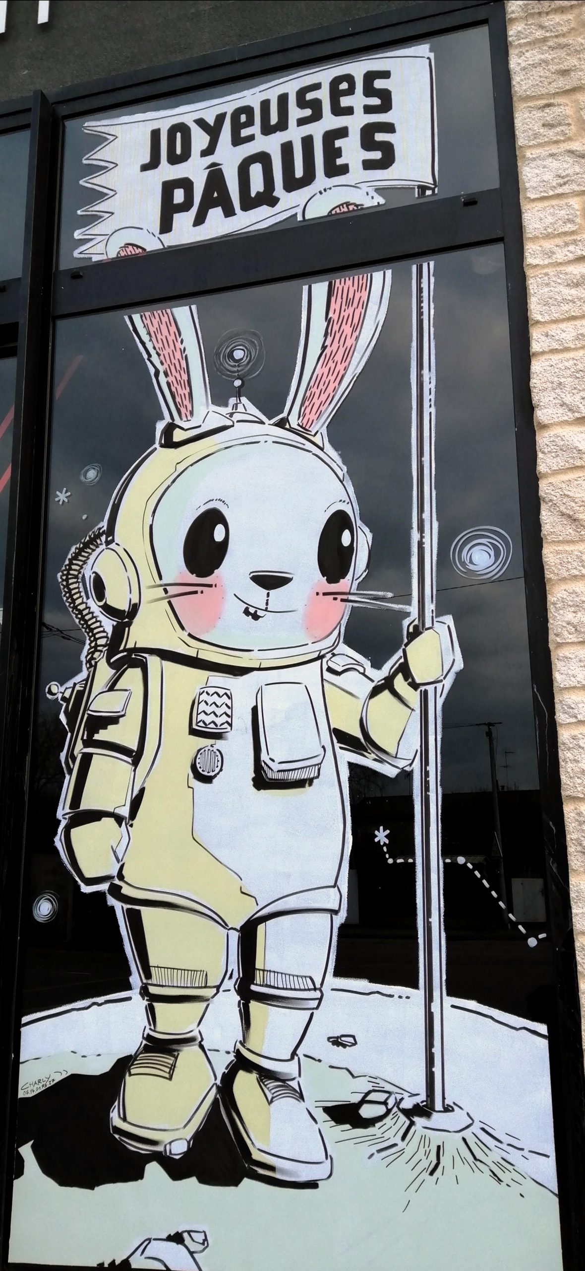Vitrine de Pâques cosmique avec lapin astronaute et décor spatial