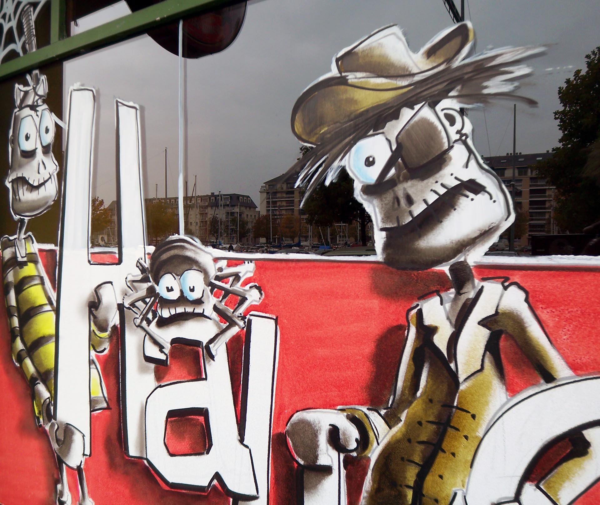 Peinture Halloween sur vitrine du pub O’Donnell’s – Jean‑Charles Varlet