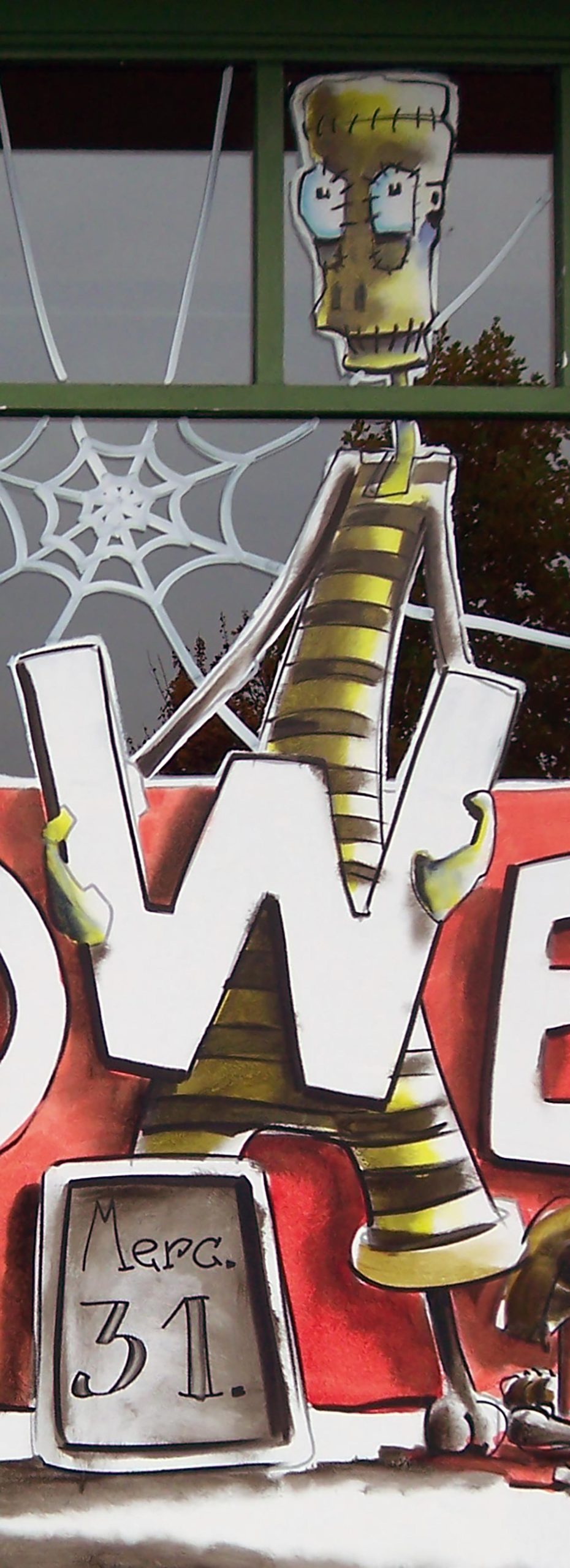 Peinture Halloween sur vitrine du pub O’Donnell’s – Jean‑Charles Varlet