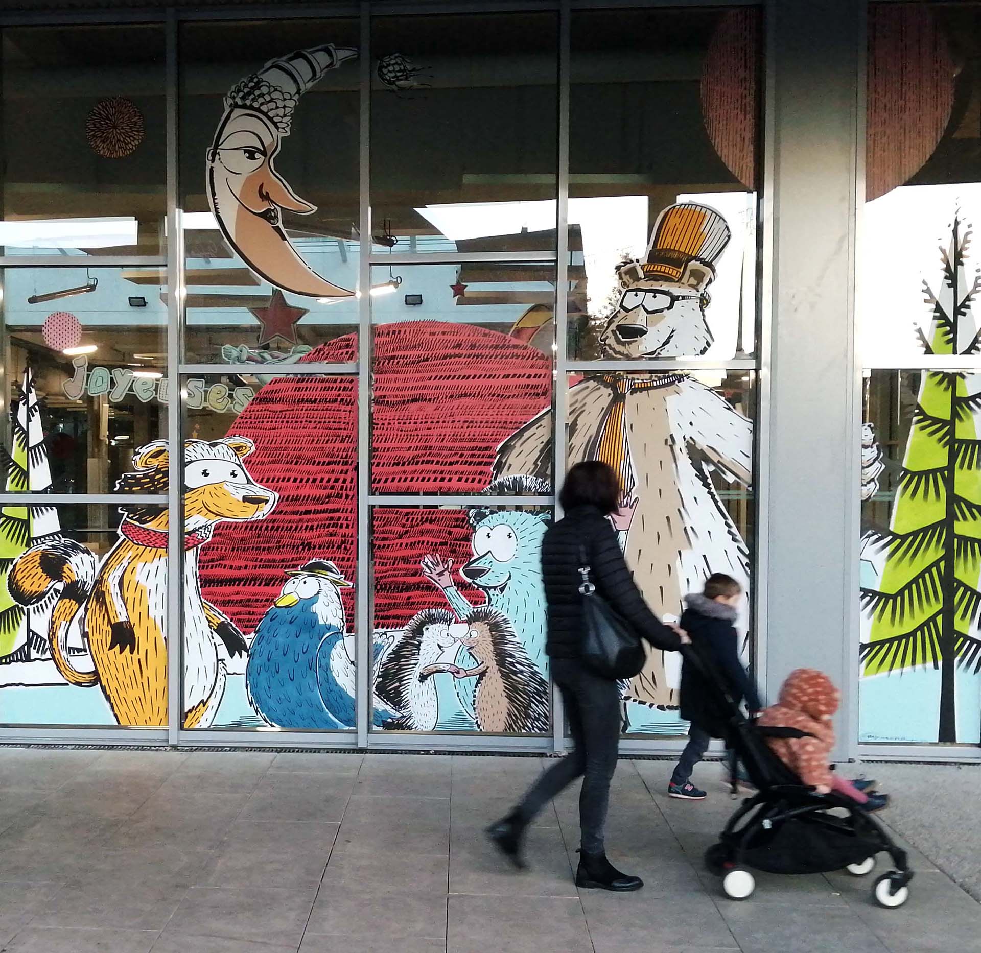 Décor de Noël peint sur la vitrine de la Halle Pagnol