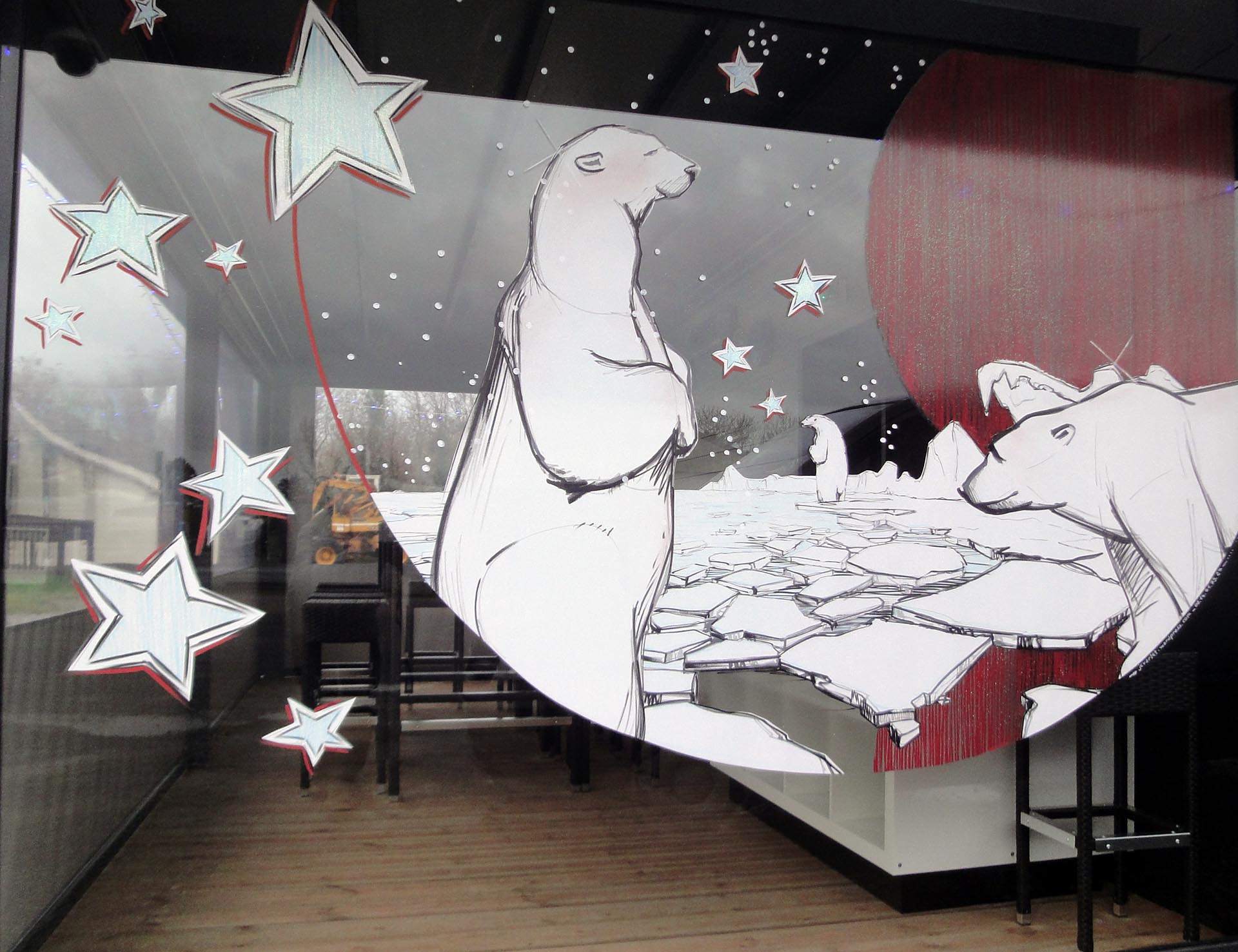 Décor de Noël banquise sur la vitrine de La Calvadosienne
